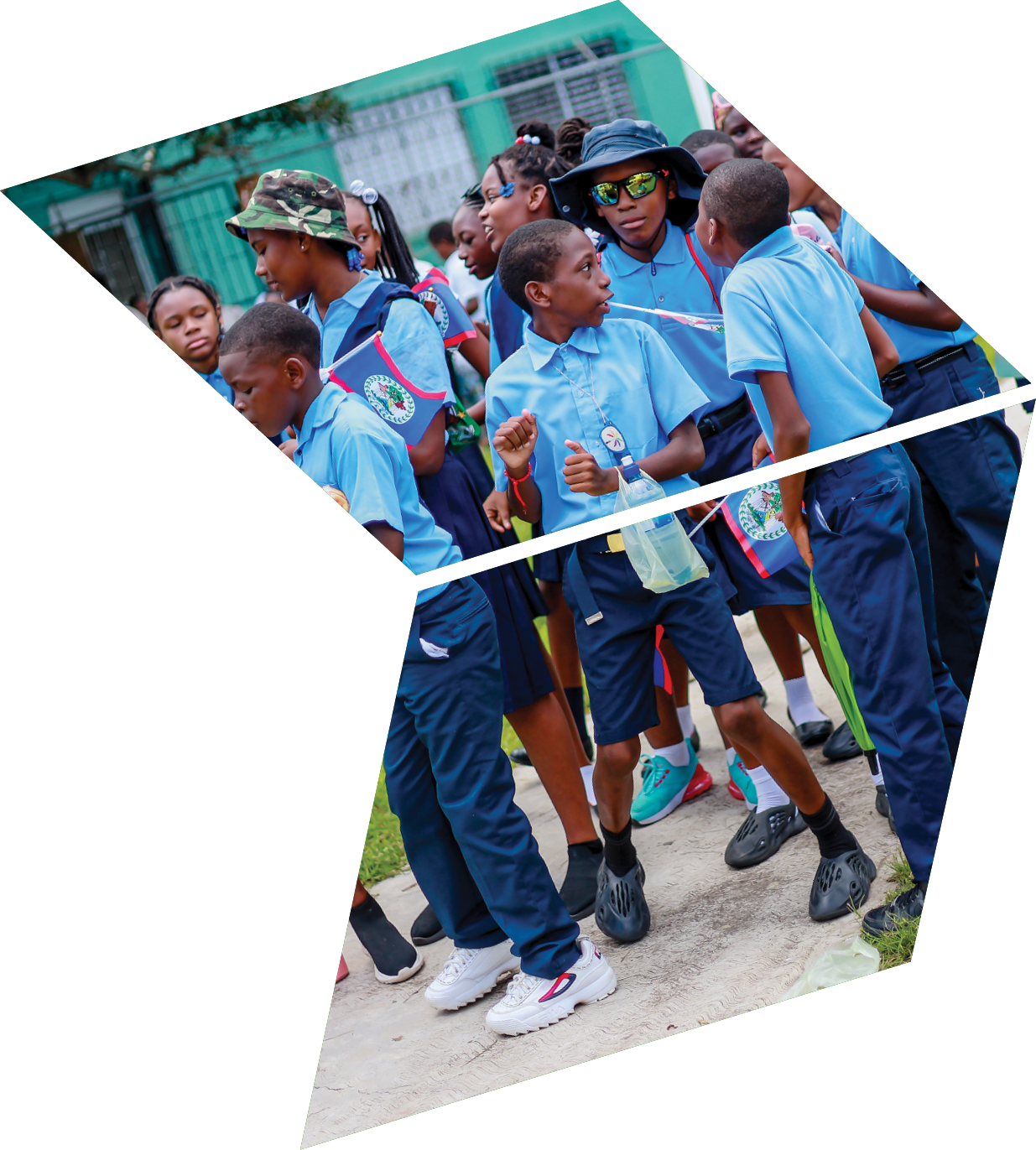 A group of children wearing blue shirts and holding water bottles. Description generated by AI